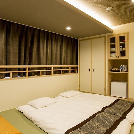 東心斎橋おおきにアパート Ookini Ryokan & Apartment Ōsaka Extérieur photo