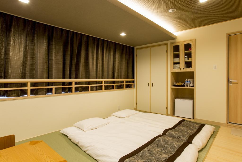 東心斎橋おおきにアパート Ookini Ryokan & Apartment Ōsaka Extérieur photo
