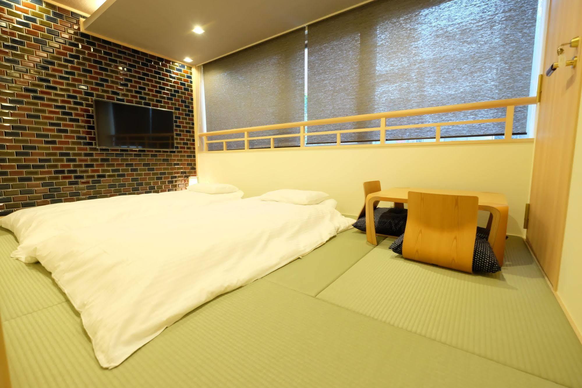 東心斎橋おおきにアパート Ookini Ryokan & Apartment Ōsaka Extérieur photo