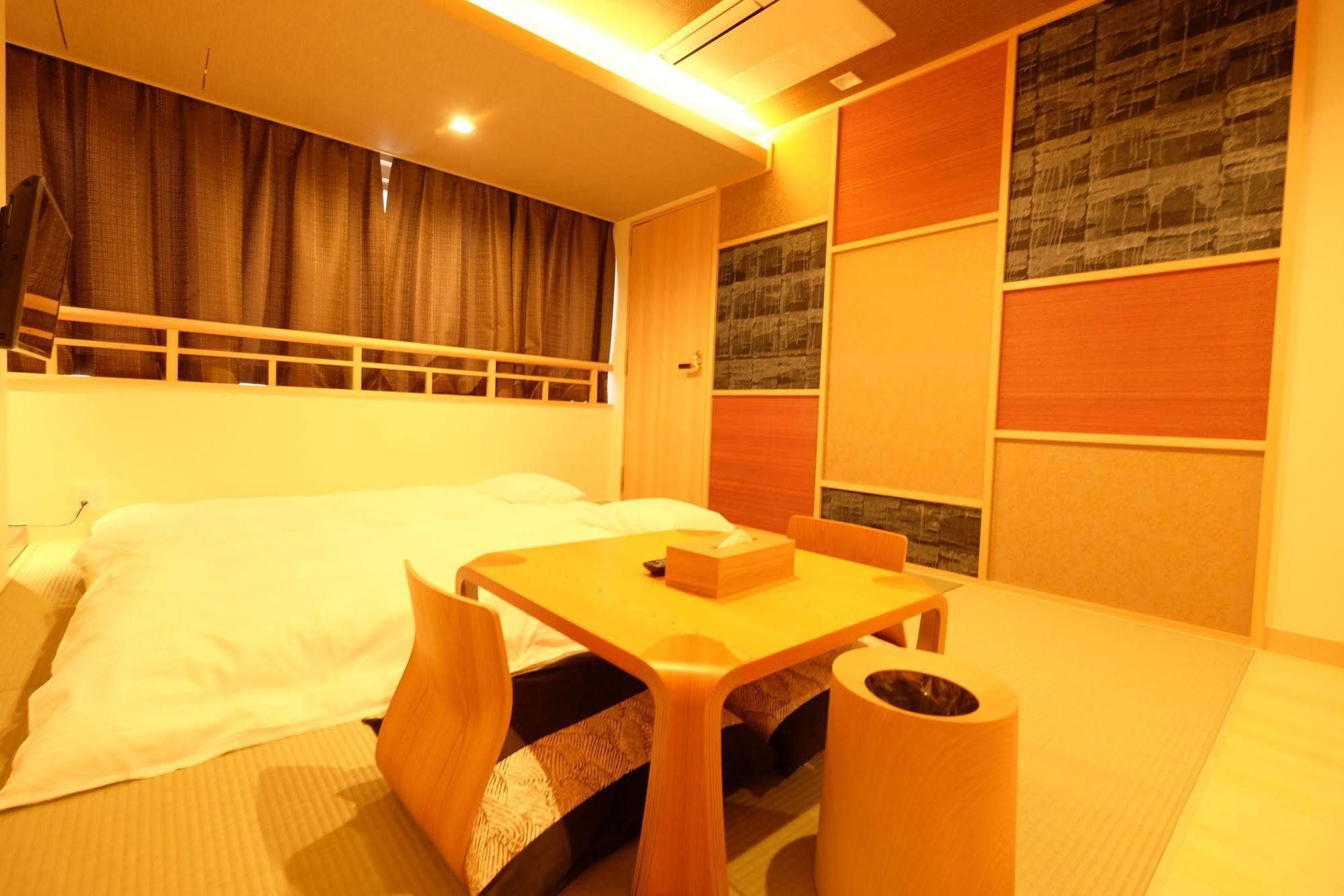 東心斎橋おおきにアパート Ookini Ryokan & Apartment Ōsaka Extérieur photo